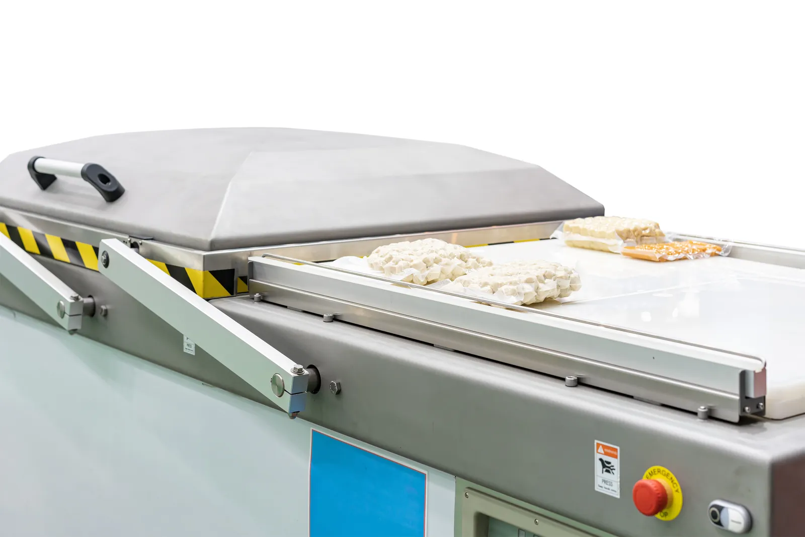 Vacuümmachine (dubbelkamer) met vacuümzakken op de lopende band — AB Flexibles